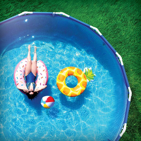 Woman floating in pool