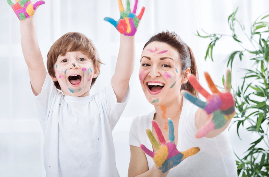 mother and son finger painting