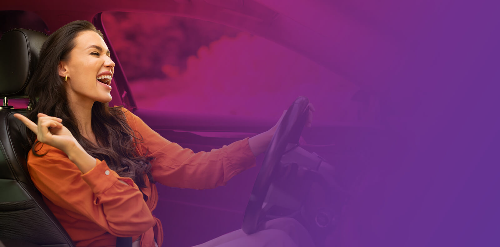 Woman singing in car