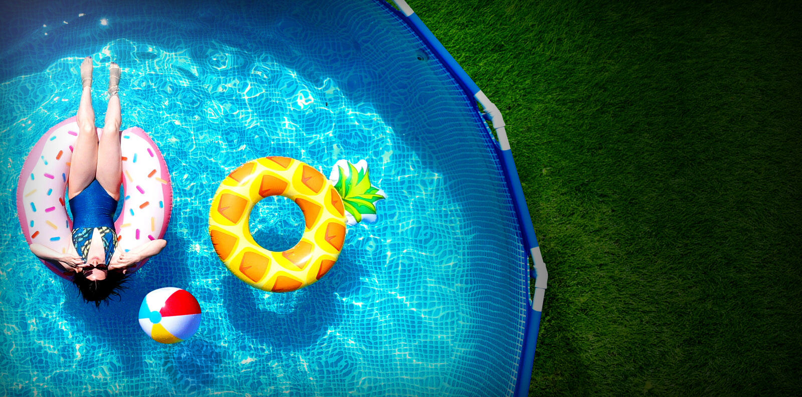 Girl floating in pool